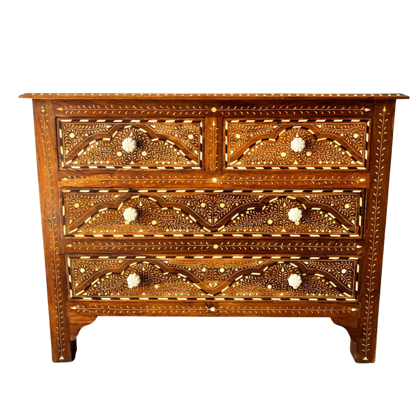 Front image of 4 drawer teak chest with bone inlay detailing and scalloped bone knobs