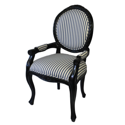 Front side angle of Agatha chair. With a hand rubbed black timber frame and a classic navy and ivory ticking striped upholstery on the front and back of the chair
