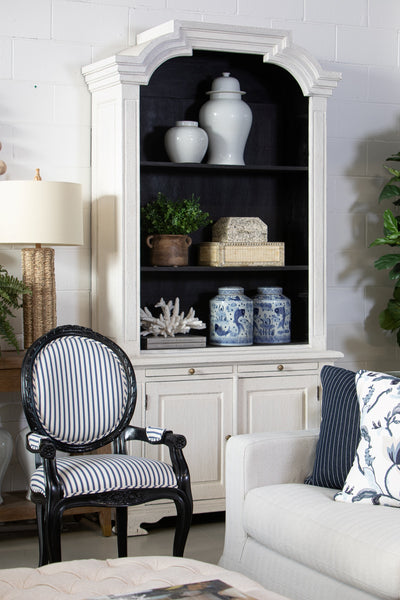 Agatha blue stripe chair featured in living room with a cabinet, sofa and console
