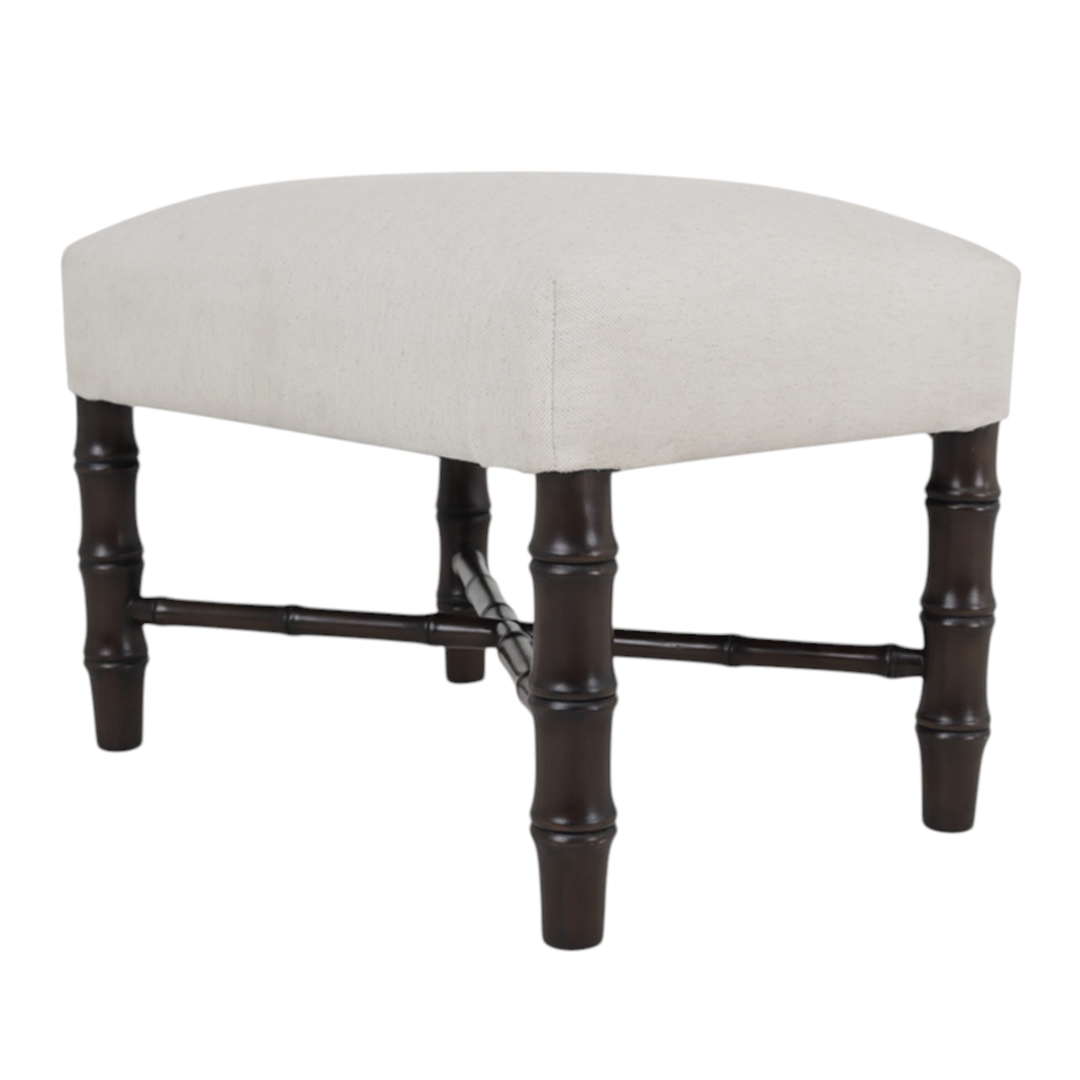 Stool with white cushioned seat and dark wooden legs on a white background