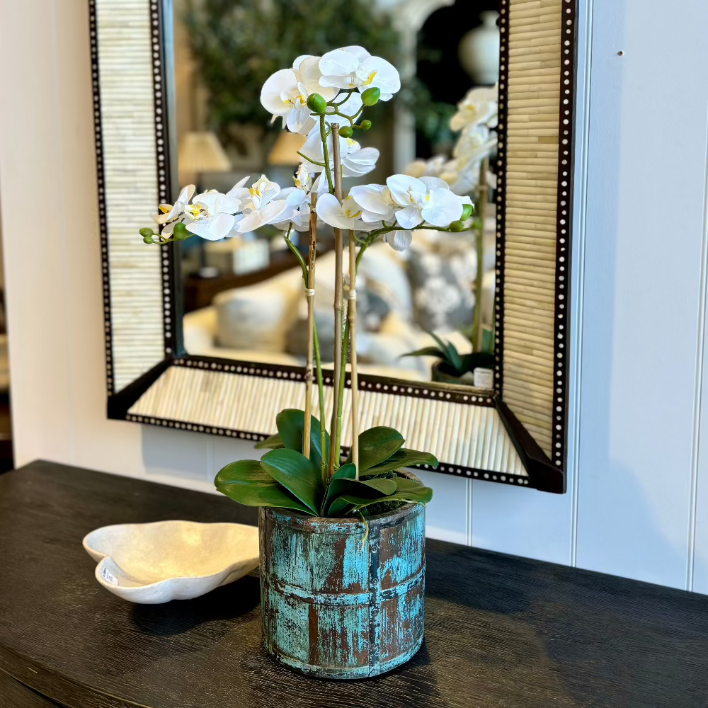 &nbsp;White Faux Phalaenopsis orchid plant designed into a blue wooden vessel