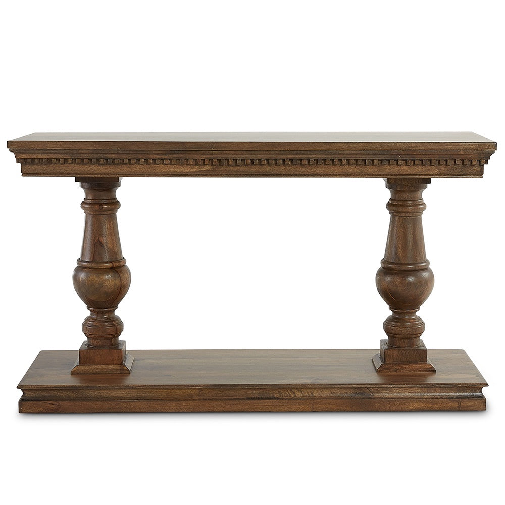Front image of laurent console with no background. Two thick turned legs and a low shelf base