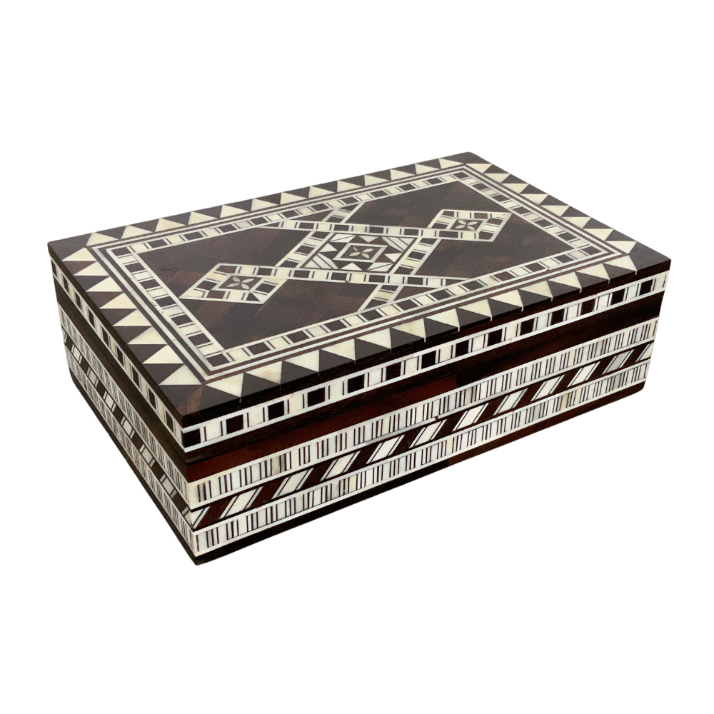 Decorative box with geometric pattern on a white background