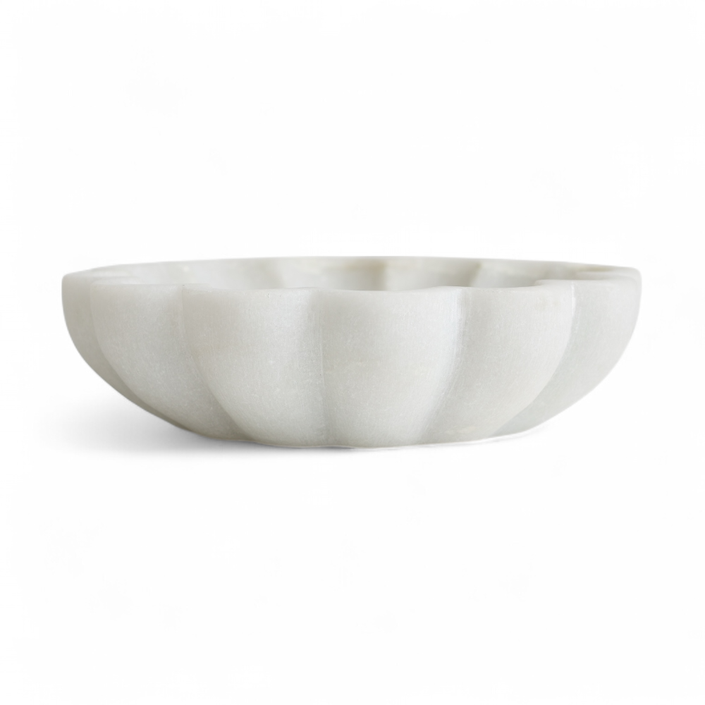 White marble bowl on a white background. Side View.