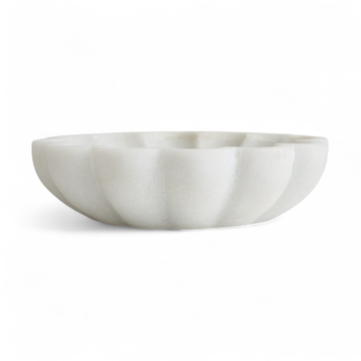 White marble bowl on a white background. Side View.