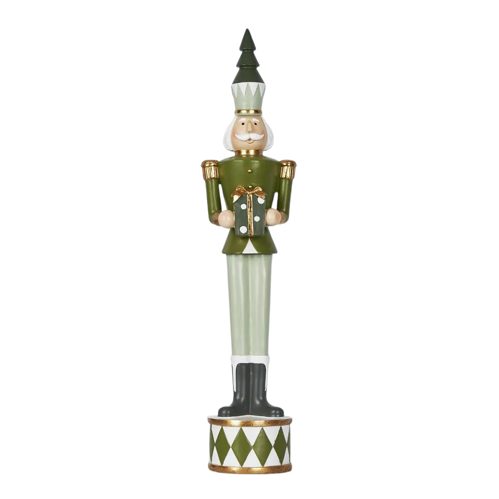 Decorative nutcracker figure with green outfit and hat on a white background