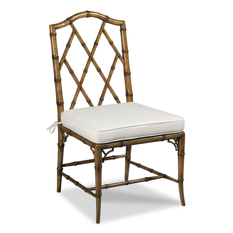 Front image of Ralph chair showing faux bamboo detailing and linen coloured seat cushion