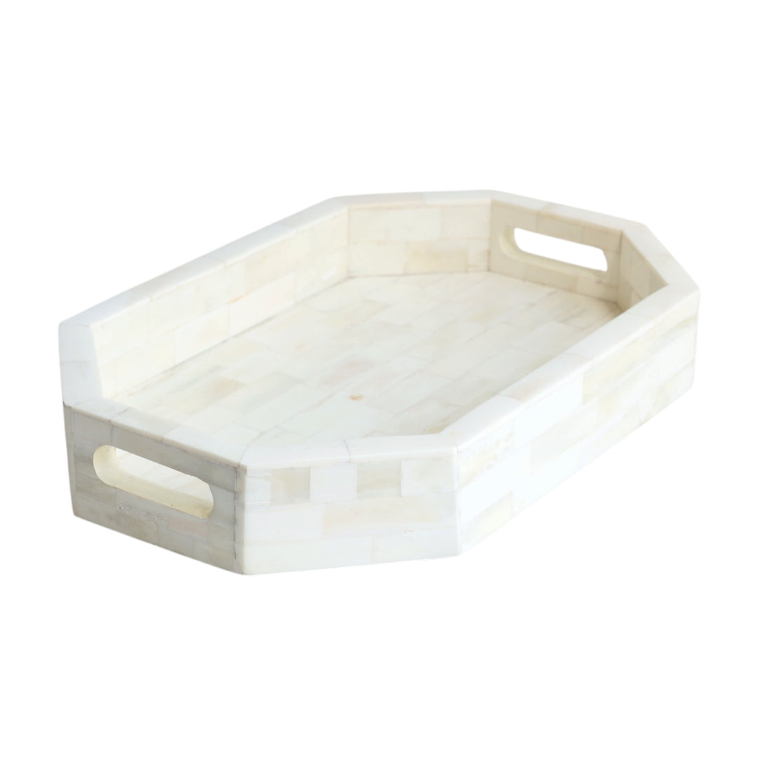 Bone tray, octagonal shape, cut out handles, white background. 
