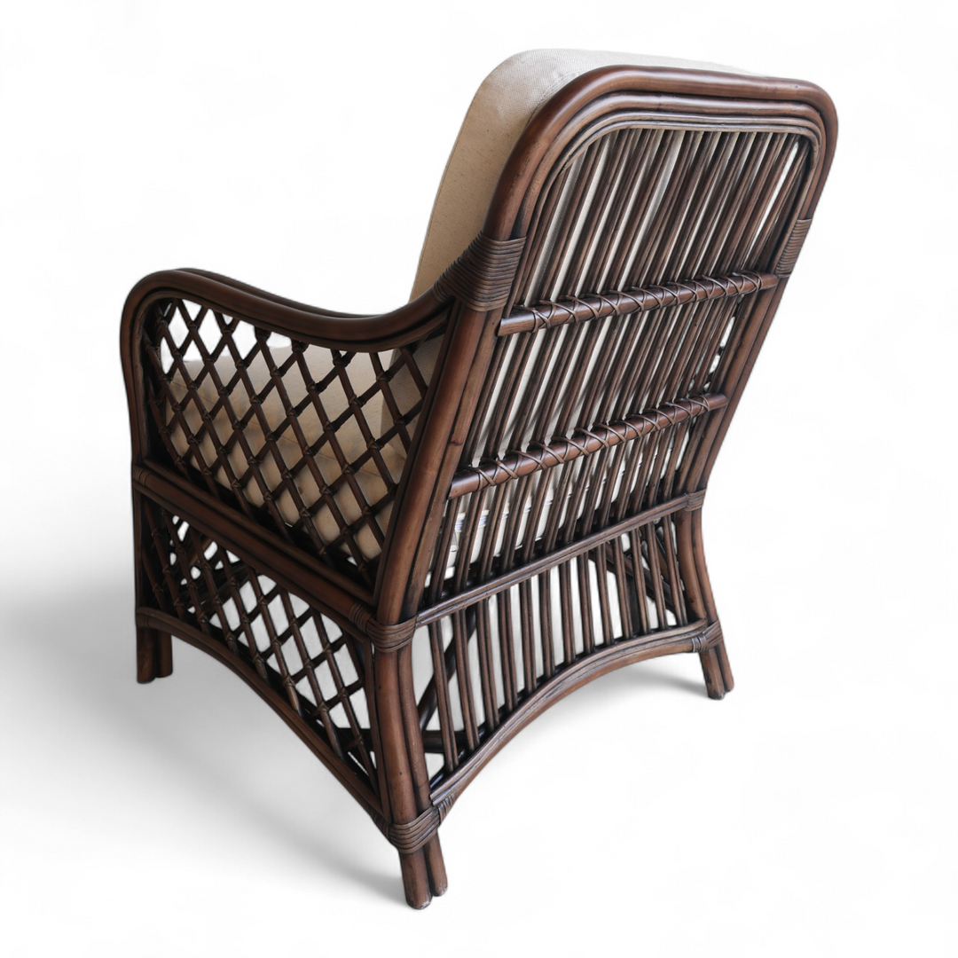 Back of rattan trellis chair on white background.