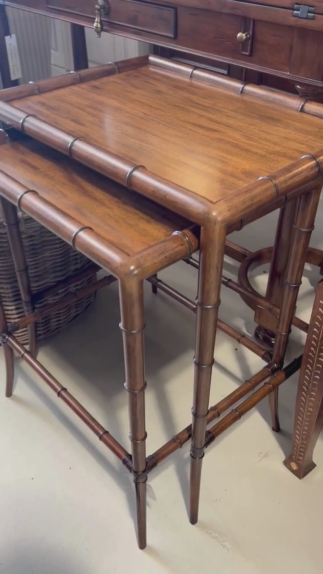 Video showing close up detail of the side and top of nesting tables