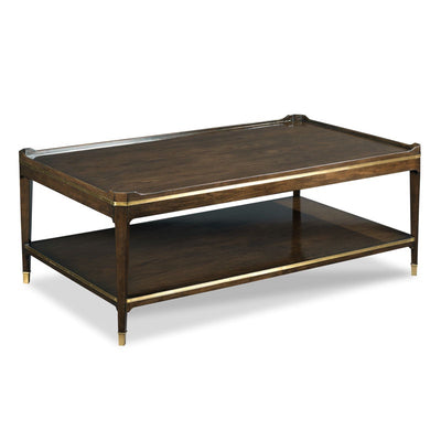 Front image of maddox coffee table, with brass mouldings and brass tipped legs