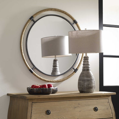 Melville mirror sitting above a console. Styled with a lamp and a fruit bowl with faux apples