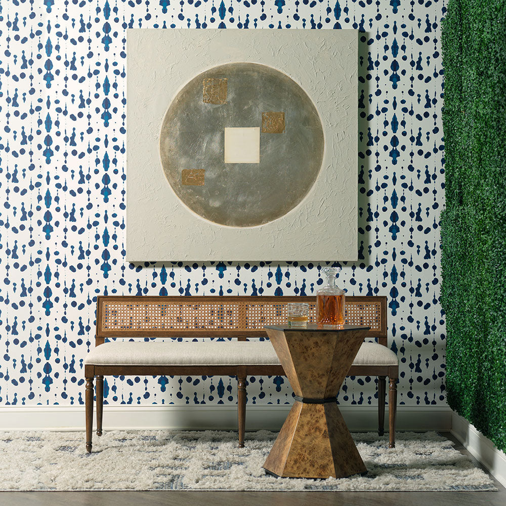 Image of Quinn Timber Bench in a hallway styled with hexagonal burl side table, bright blue and white blotted wallpaper and a large artwork